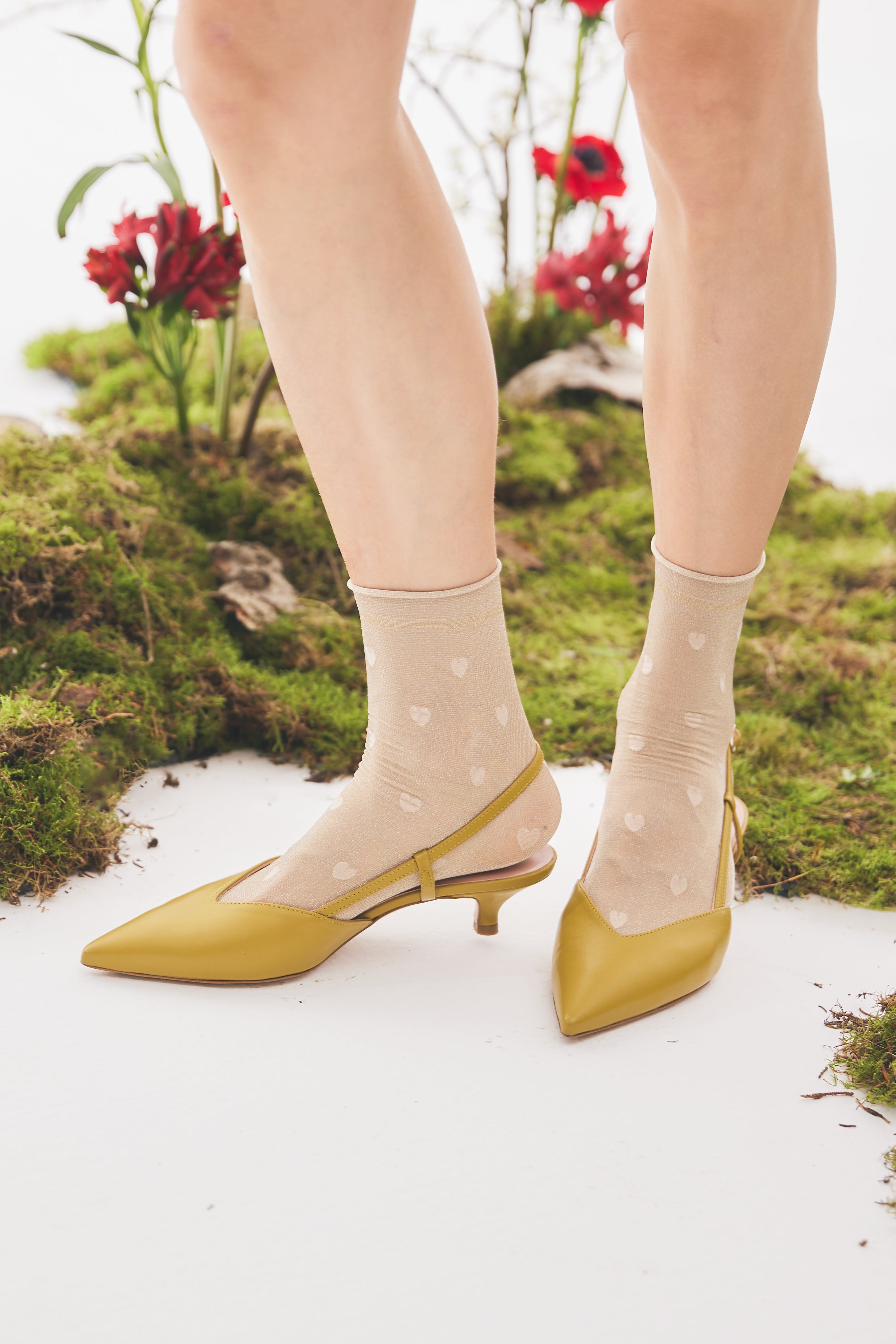 Slingback in vitello lime con tacco conico a coda 50mm