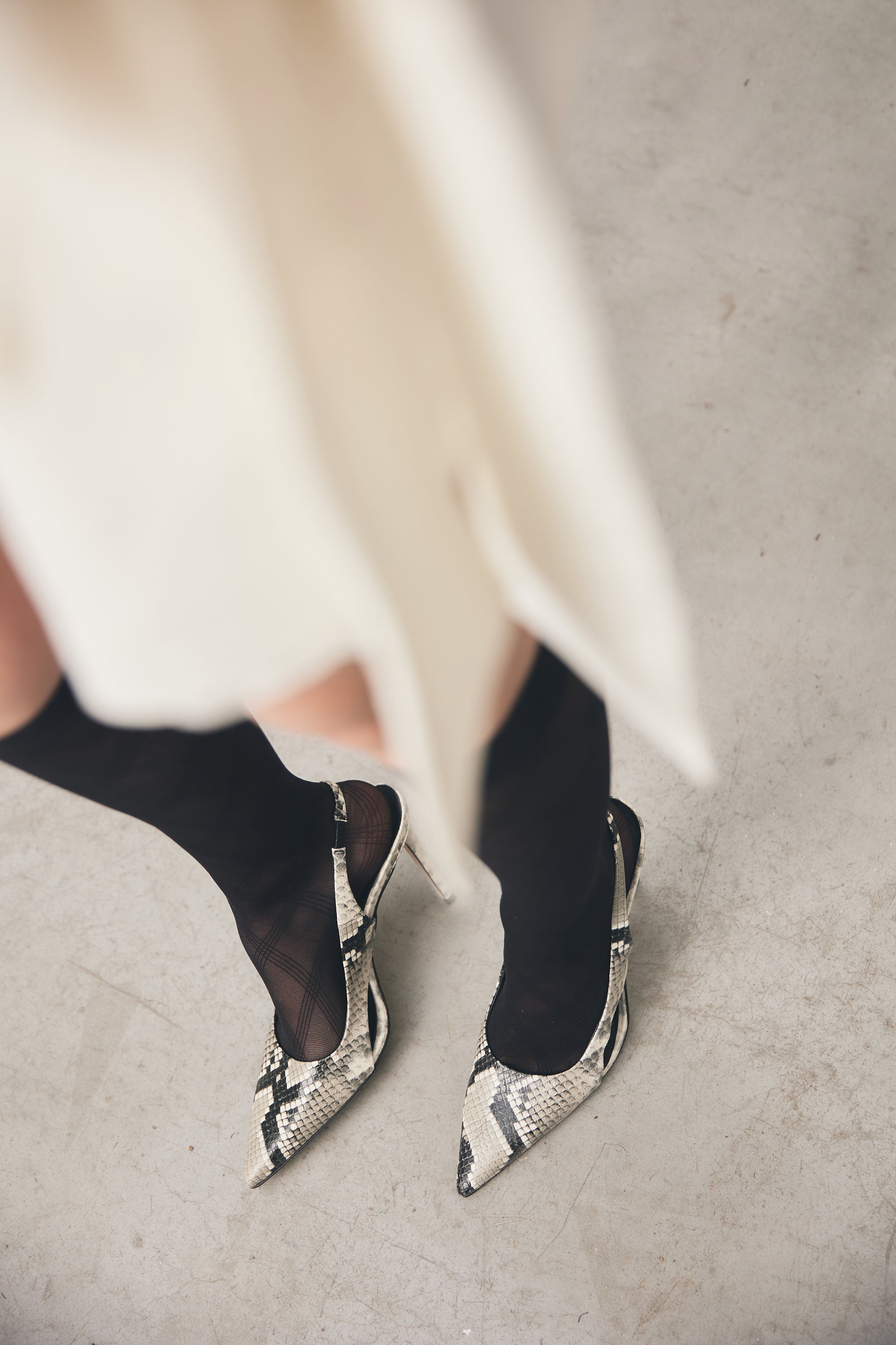 Slingback in vitello stampato pitone con tacco a stiletto