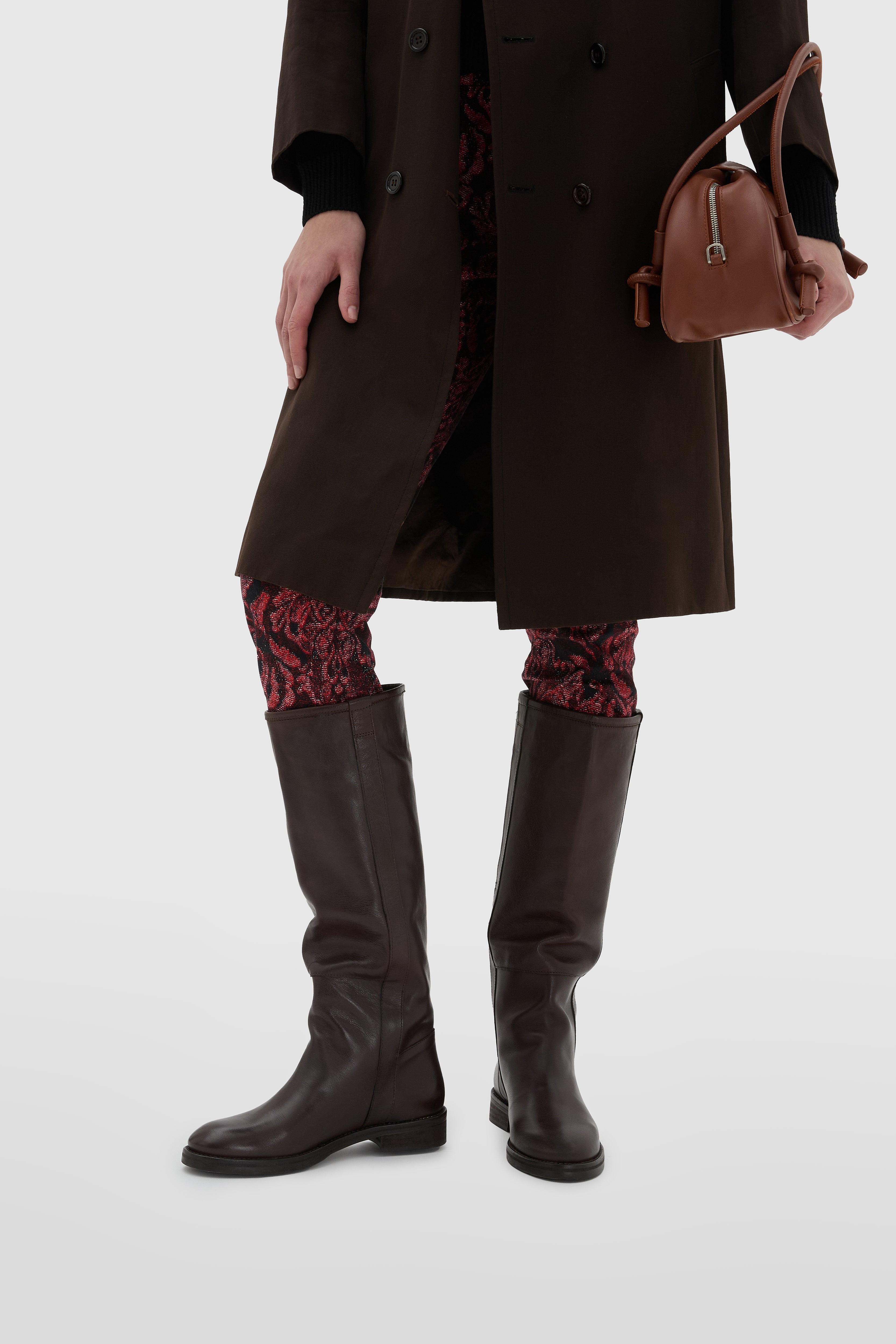 Dark brown calfskin boot with side strap and leather and rubber sole