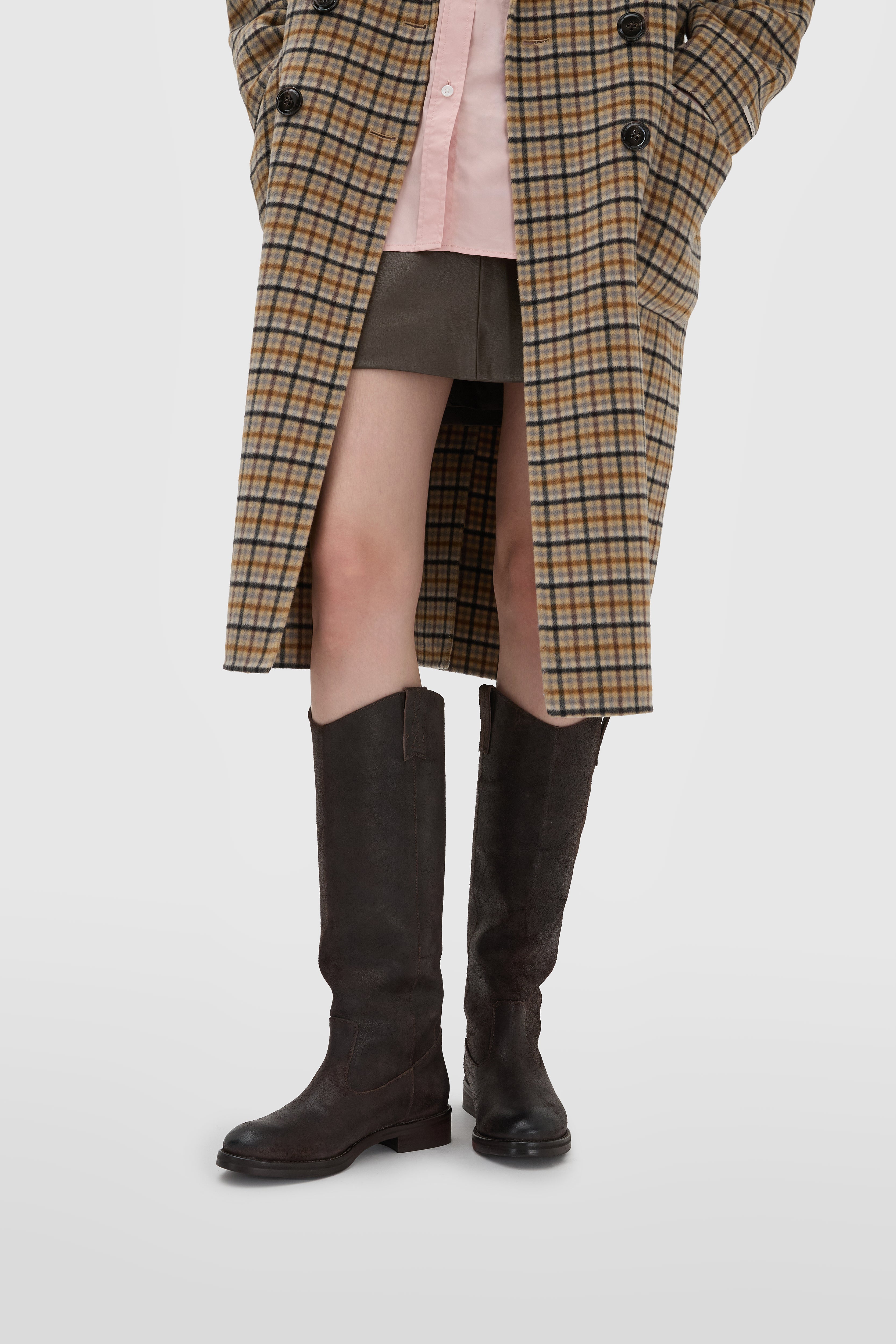 Dark brown split leather boot with embroidery on the straps