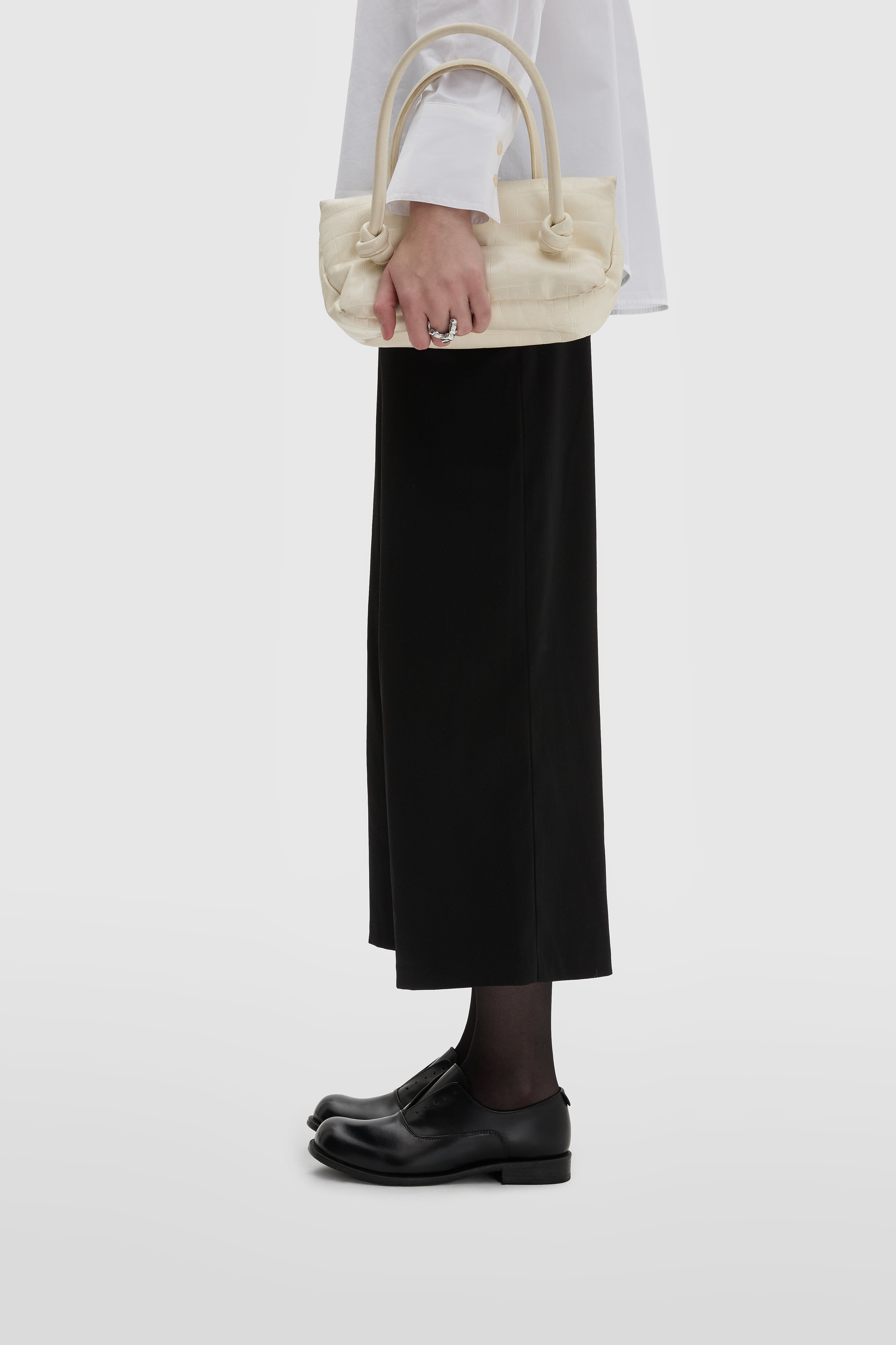 Oxford in black brushed calfskin with mixed leather and rubber sole