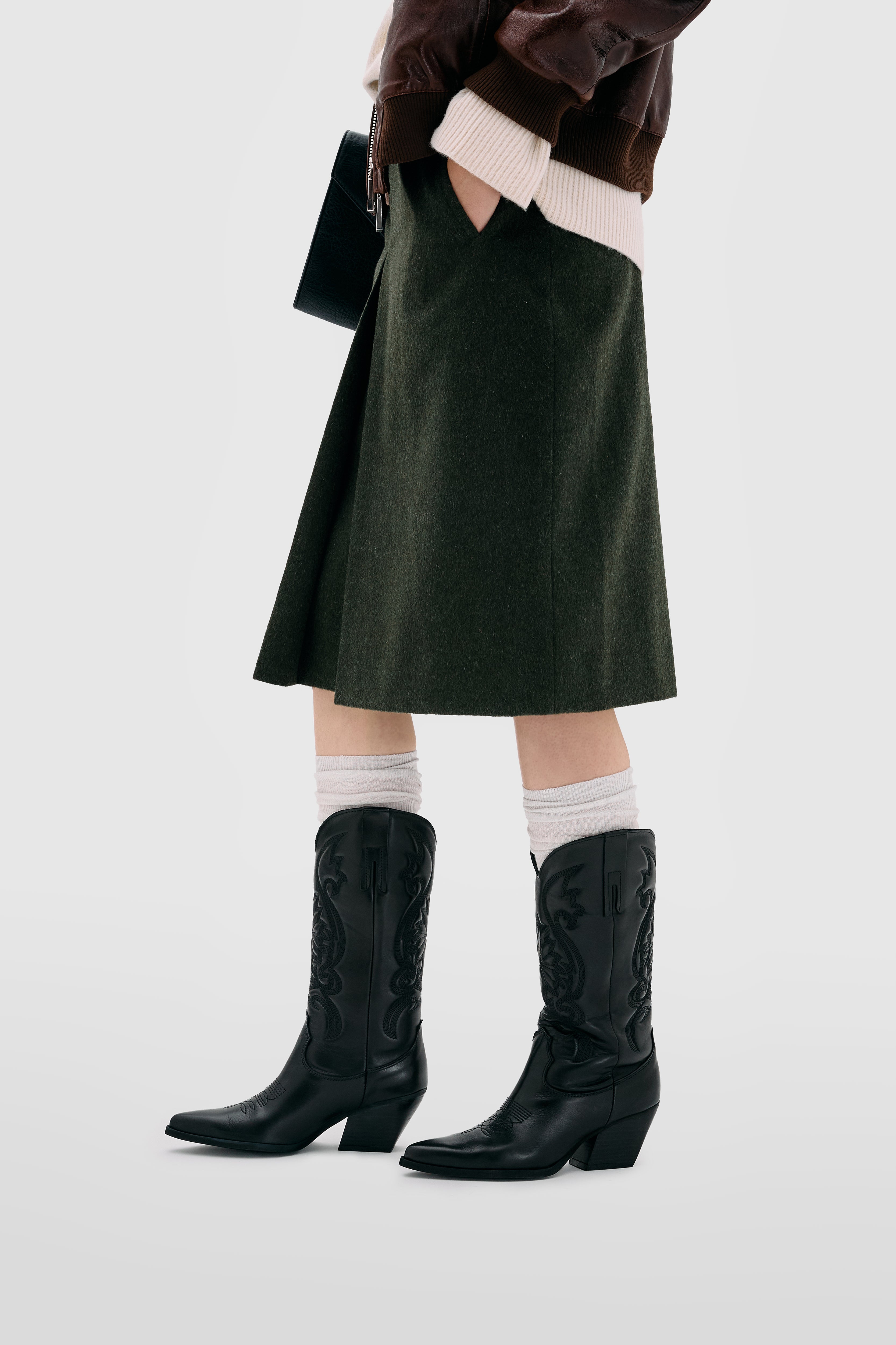 Western boots in black calfskin with tone-on-tone stitching and medium heel