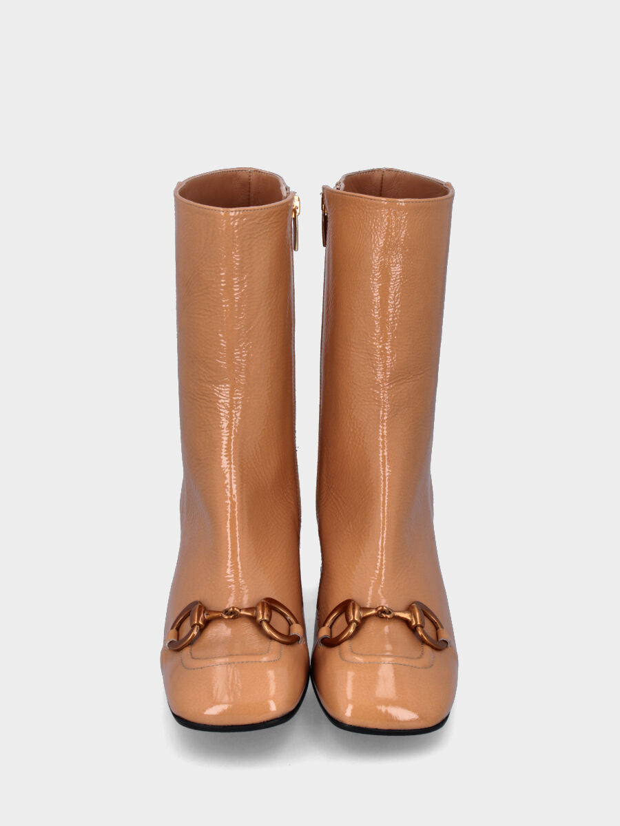 Stivaletto beige in pelle con bordatura e morsetto