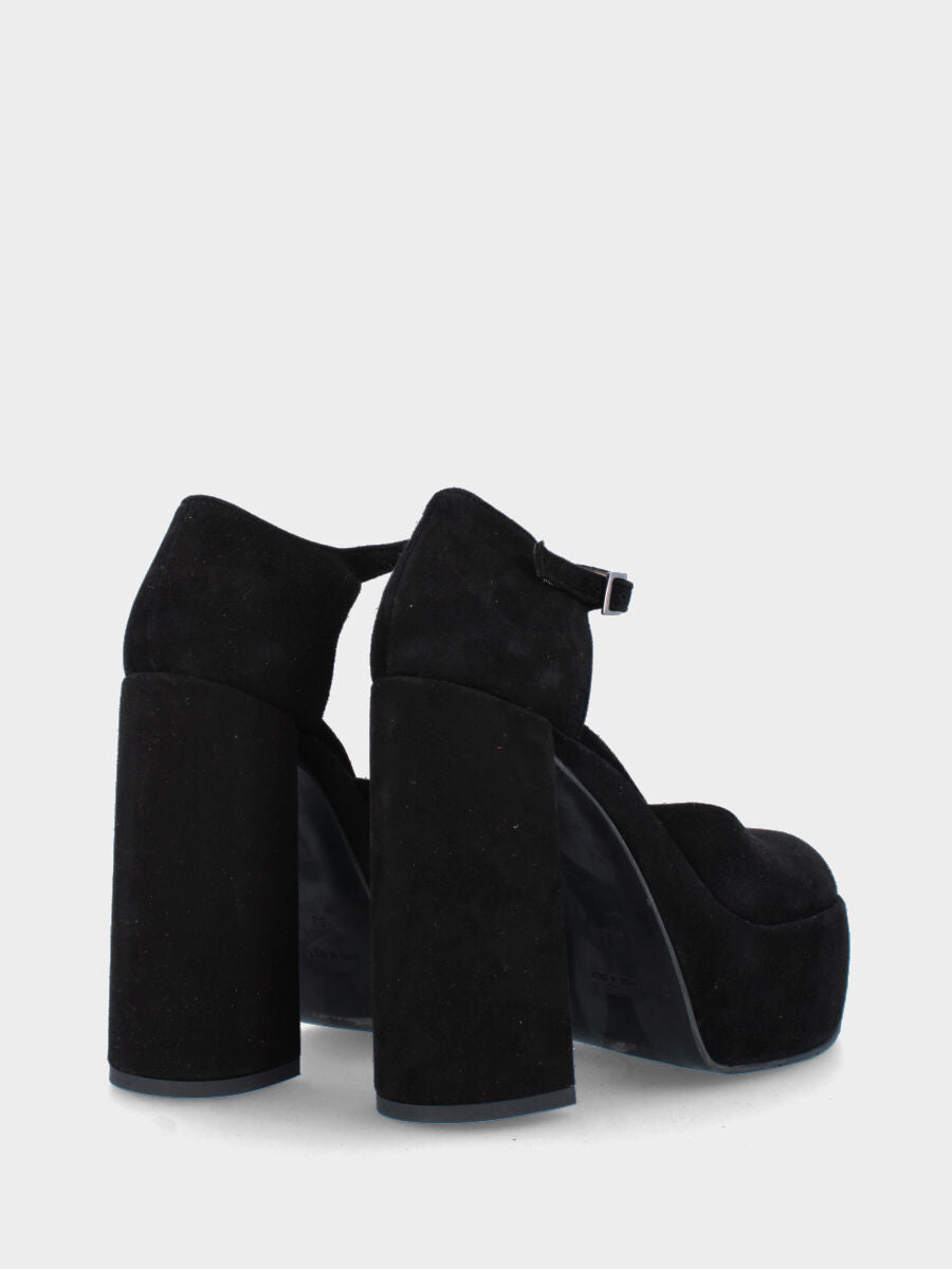 Décolleté nera in pelle aperta ai lati con maxi plateau