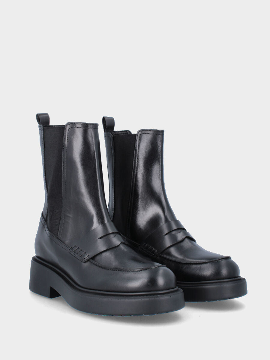 Black leather ankle boot with loafer-style loop