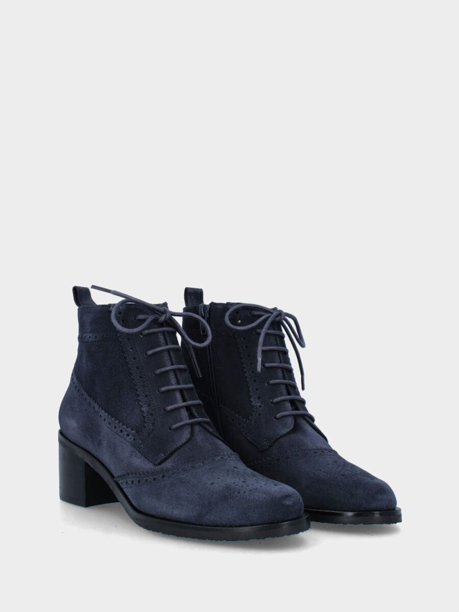Blue leather loafer with perforated decorations