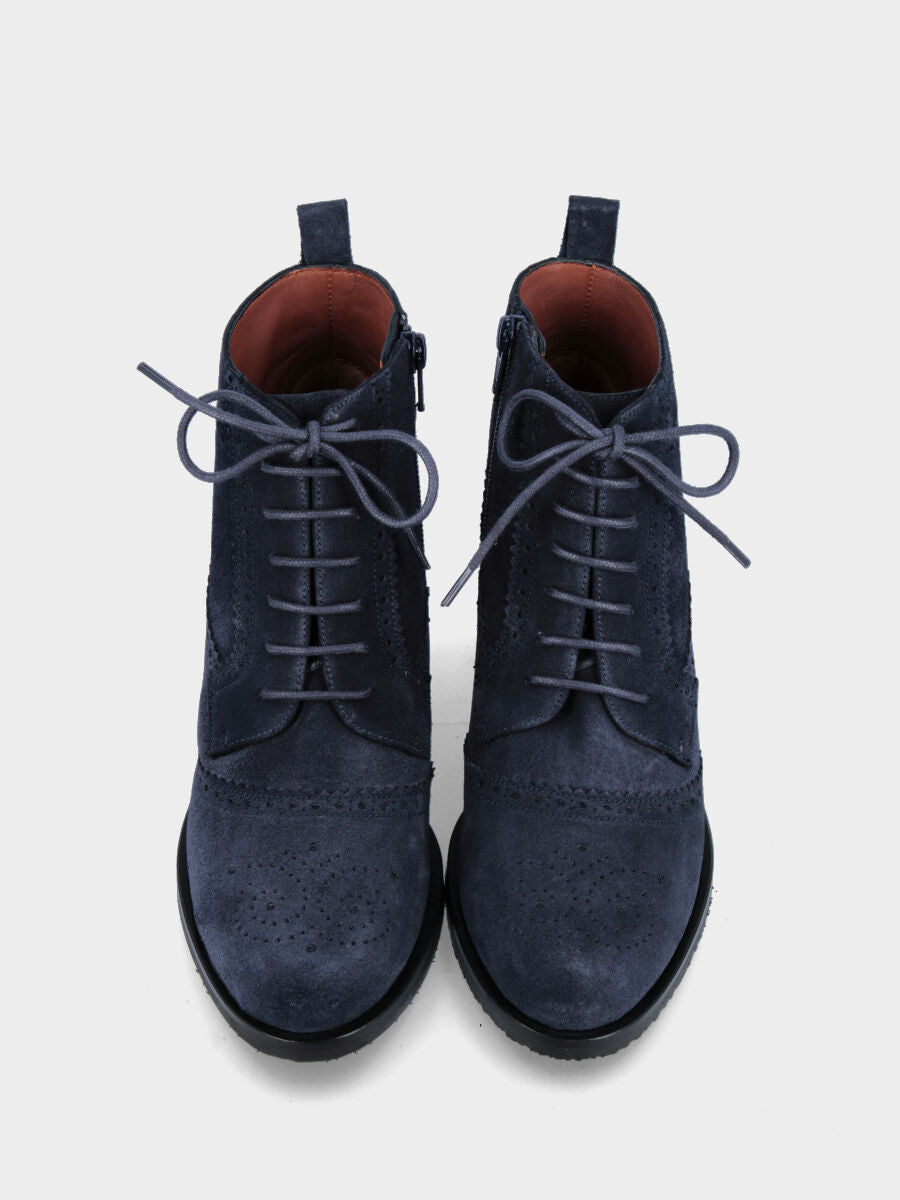 Polacchino blu in pelle con decorazioni perforate