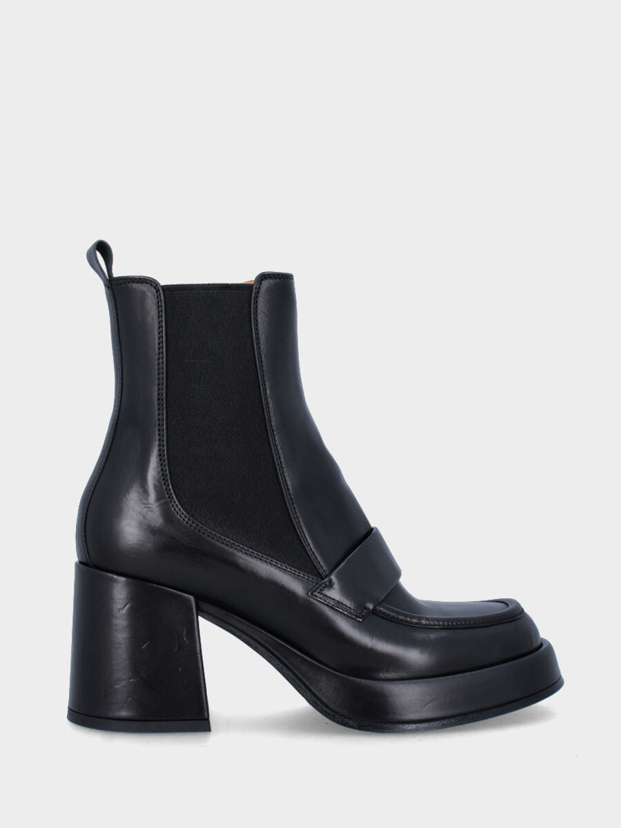 Bottine noire en cuir avec plateau et bride à boucle