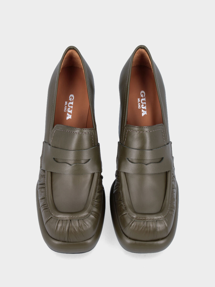 Green leather moccasin with bell heel and platform