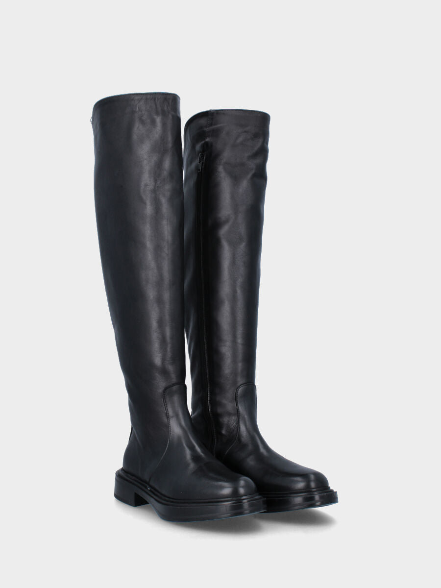 bottes à talon de 20 mm sur monobloc avec plateau de 10 mm, bout rond, tige arrondie en haut, semelle en caoutchouc lisse