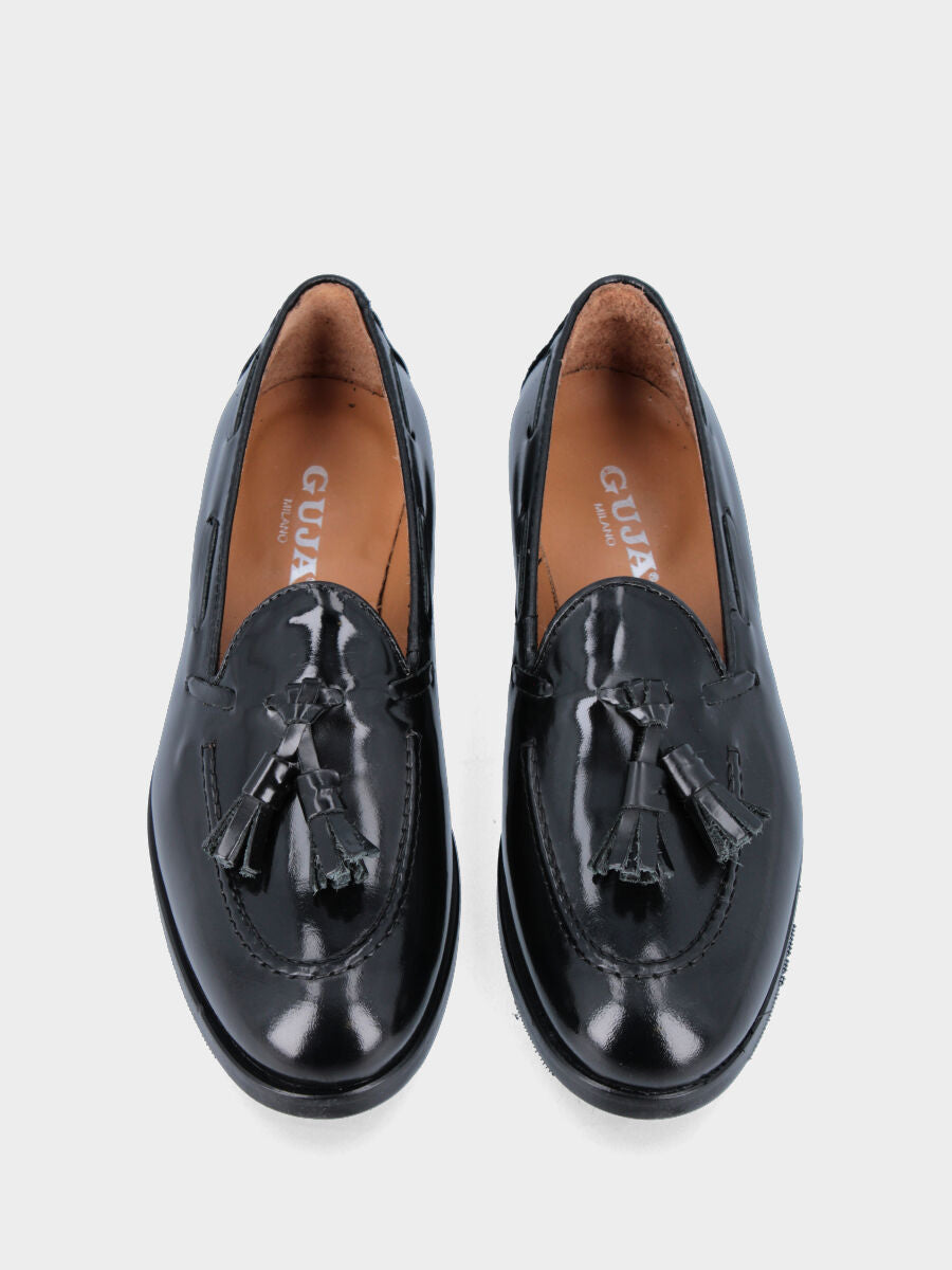 Mocassino nero in pelle con nappine