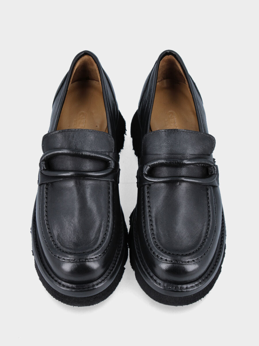 Mocassino nero in pelle con accessorio ovoidale