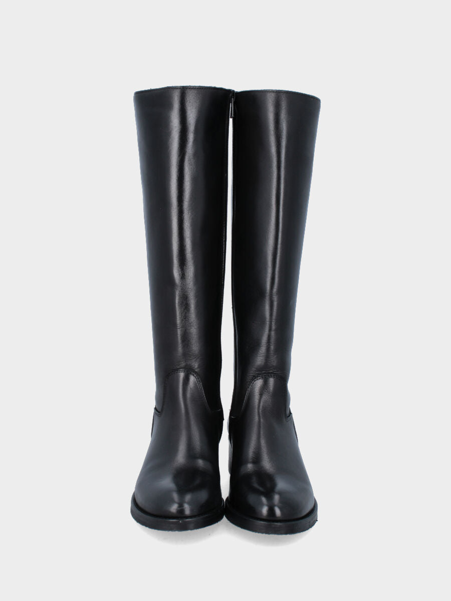 Botte noire en cuir avec fermeture éclair le long de la tige