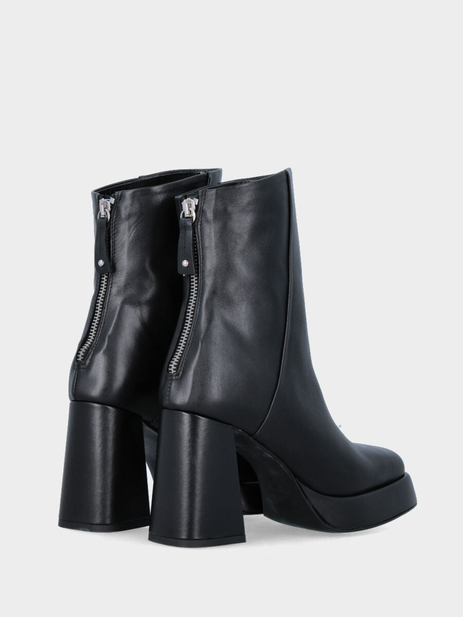 Bottine noire en cuir avec talon large et plateau
