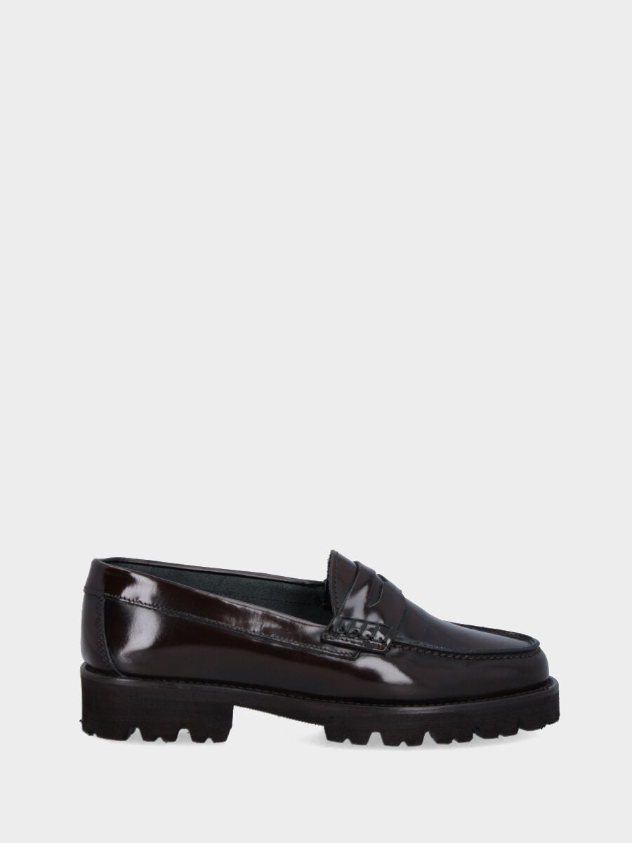Mocassin marron en cuir avec bordure et masque en forme de bouche de lion