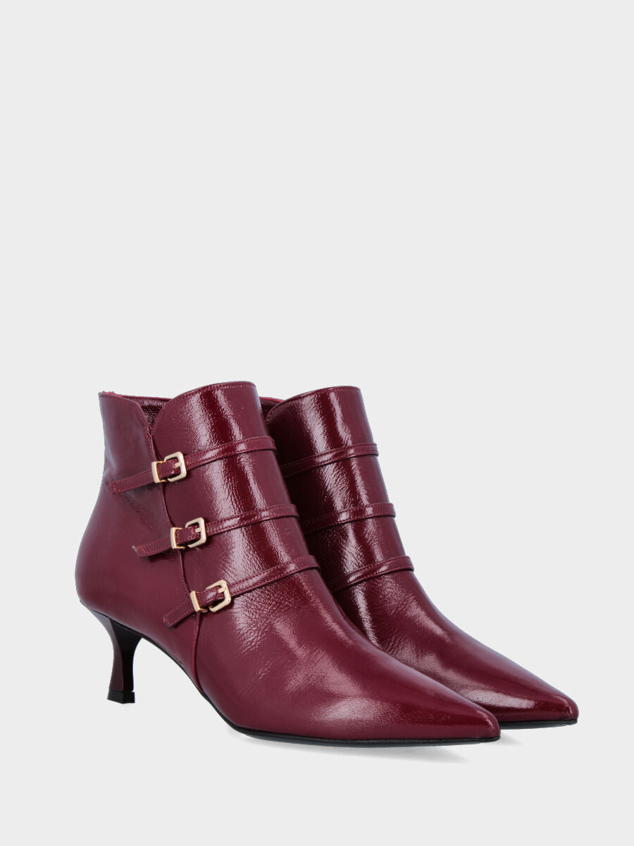 Burgundy shiny velvet ankle boot with chalice heel and straps