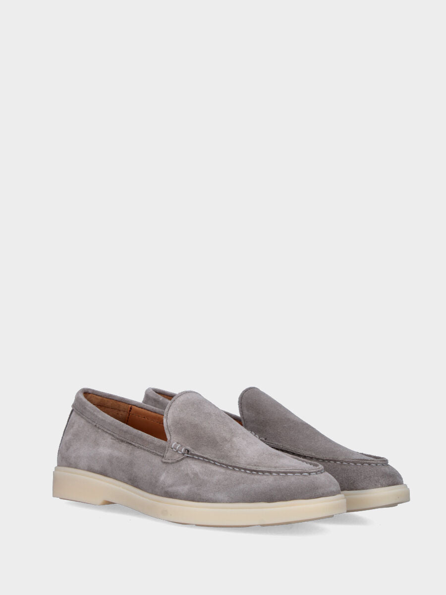 Gray suede moccasin with stitched tray joint to the upper