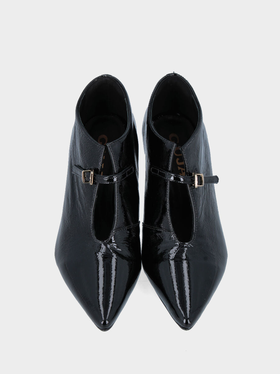 Black patent leather ankle boot with thin stiletto heel and strap