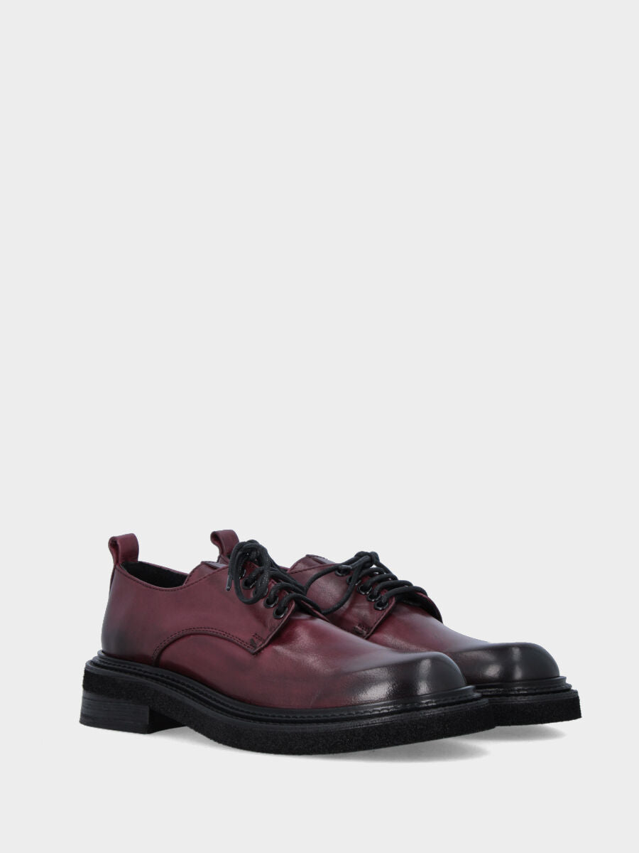 Sandalo monoblocco in vitello rosso con fascia ripiegata