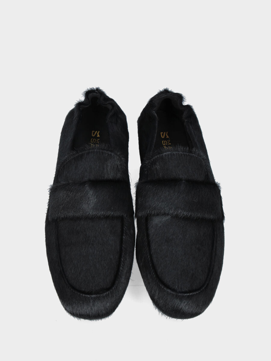 Mocassino in cavallino nero con punta quadrata e lavorazione a sacchetto