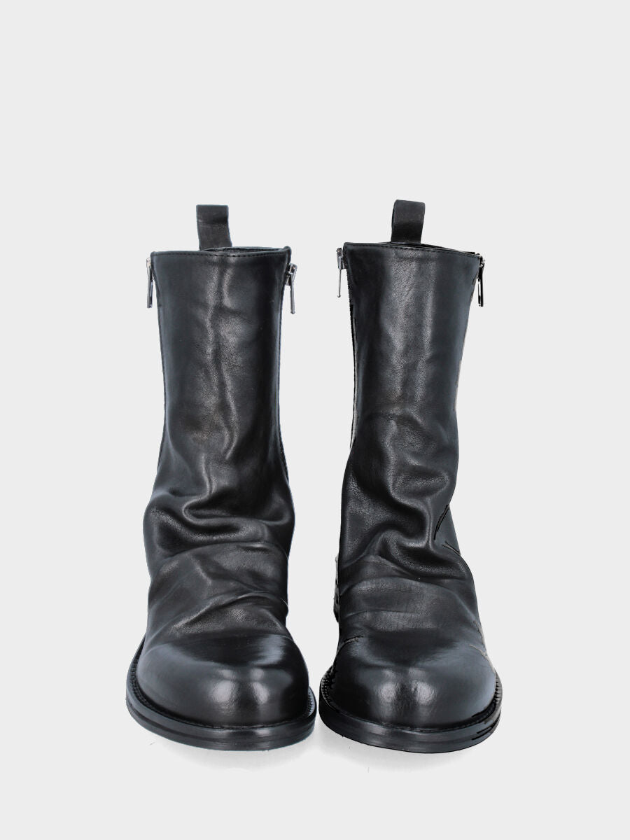 Black calfskin ankle boot with embossing on the collar and low heel