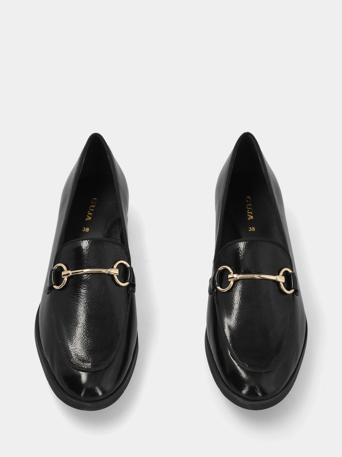 Mocassino in naplack nero con morsetto metallico