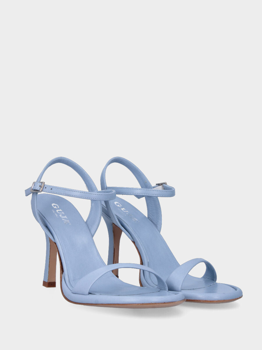 Sandale à talon bleu ciel en cuir avec bride sous le pied
