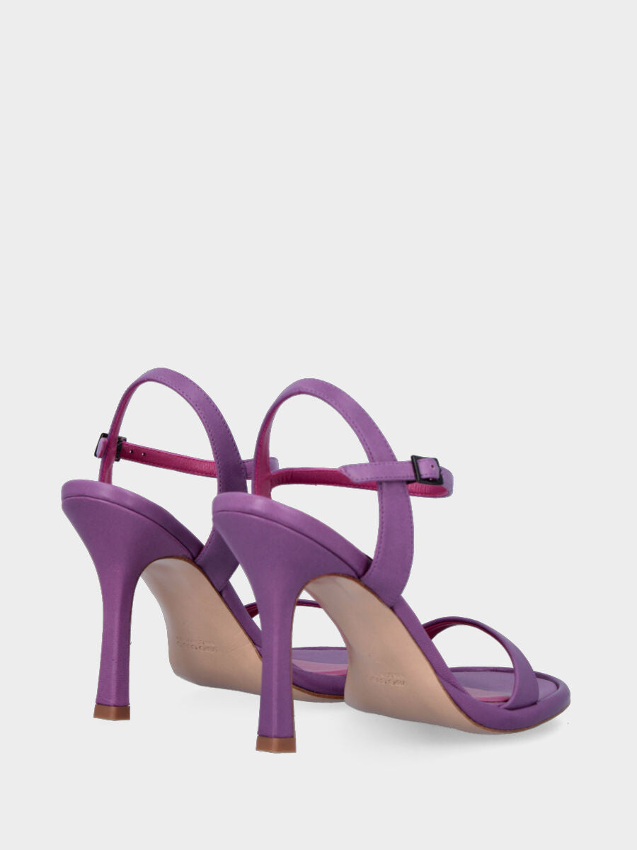Lilac leather heeled sandal with strap on the sole