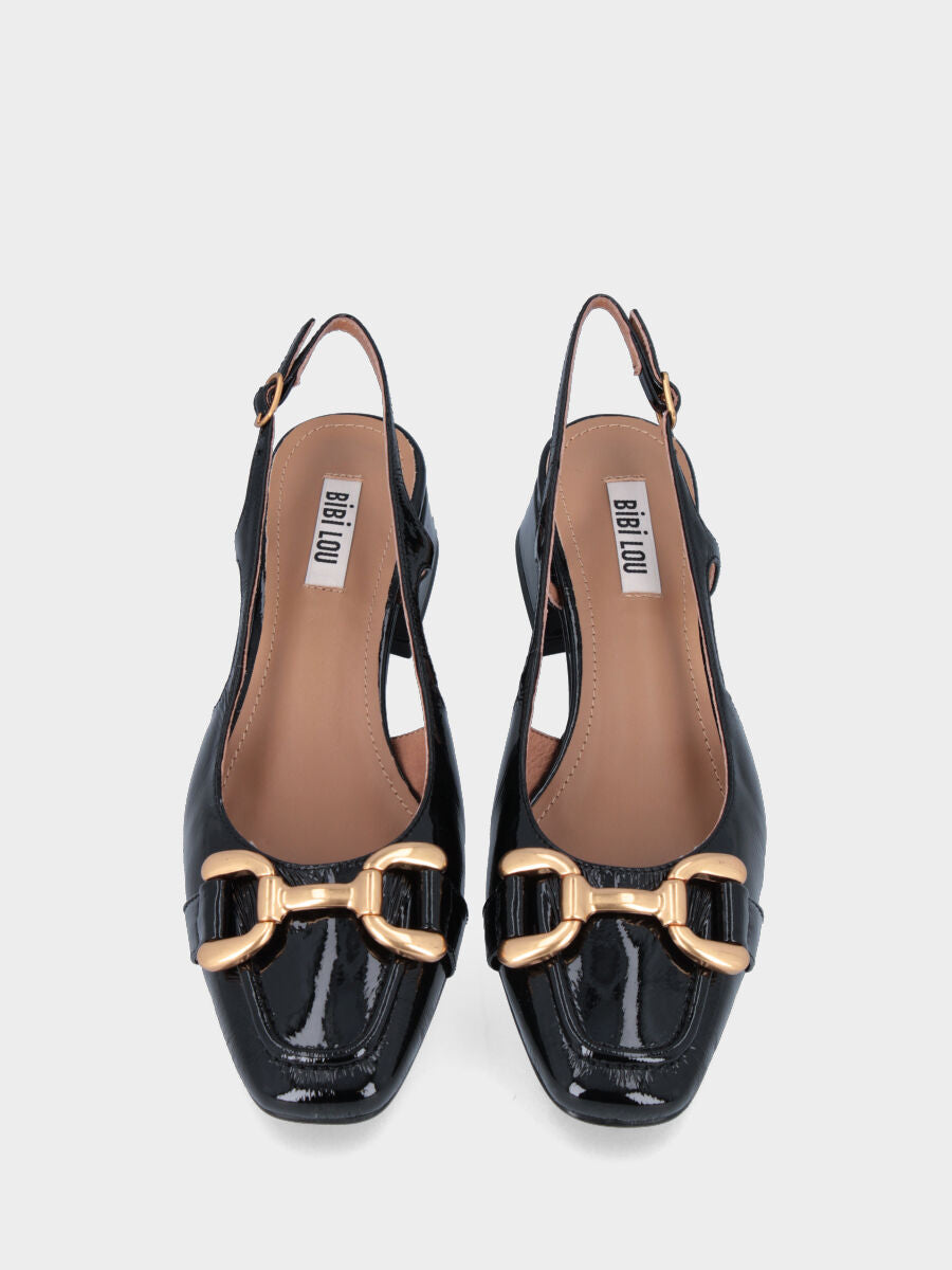 Slingback nera in pelle con punta sfilata arrotondata