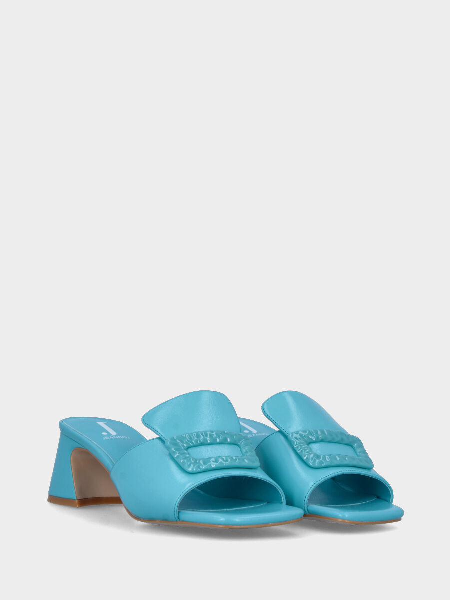 Light blue leather slipper with rectangular button