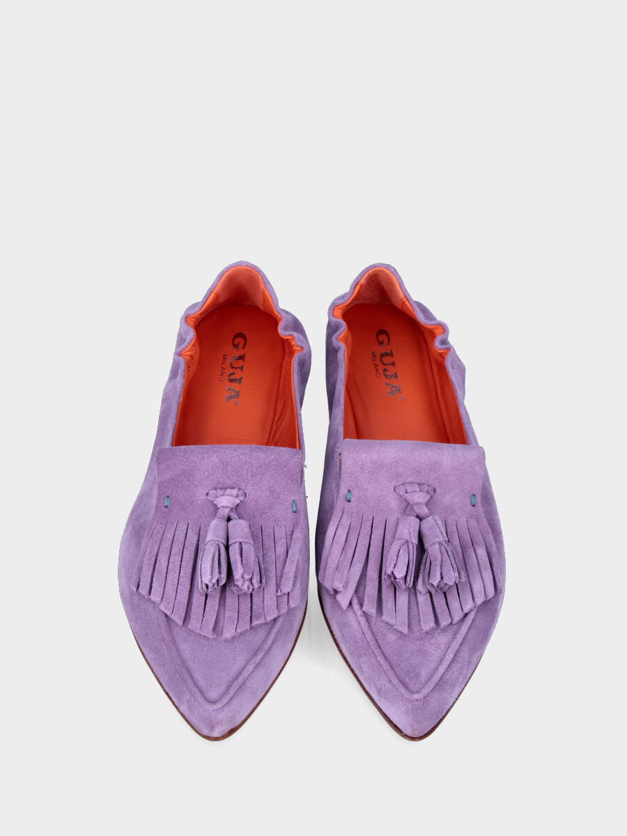 Lilac leather moccasin with fringes and tassels on the toe and elastic at the heel