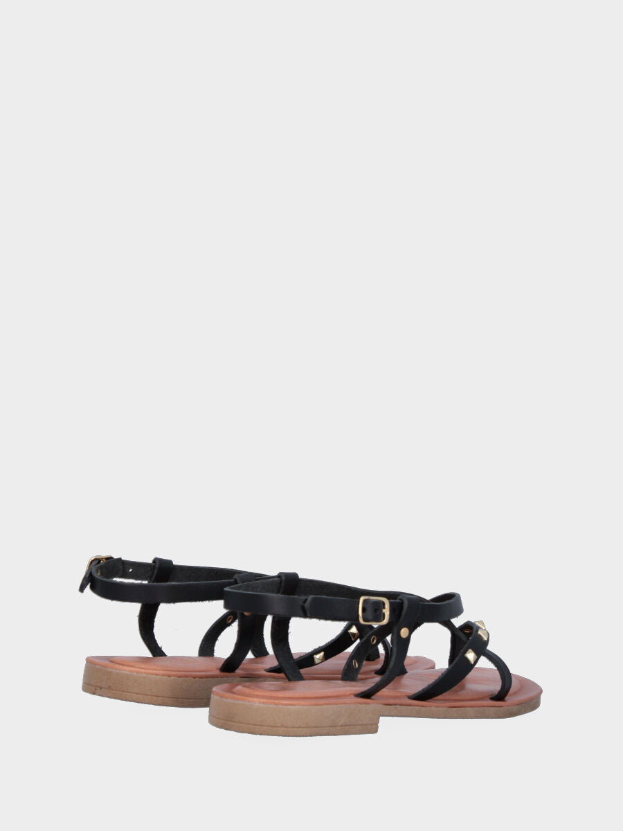 Sandale tongs noire en cuir avec lanières croisées et clous
