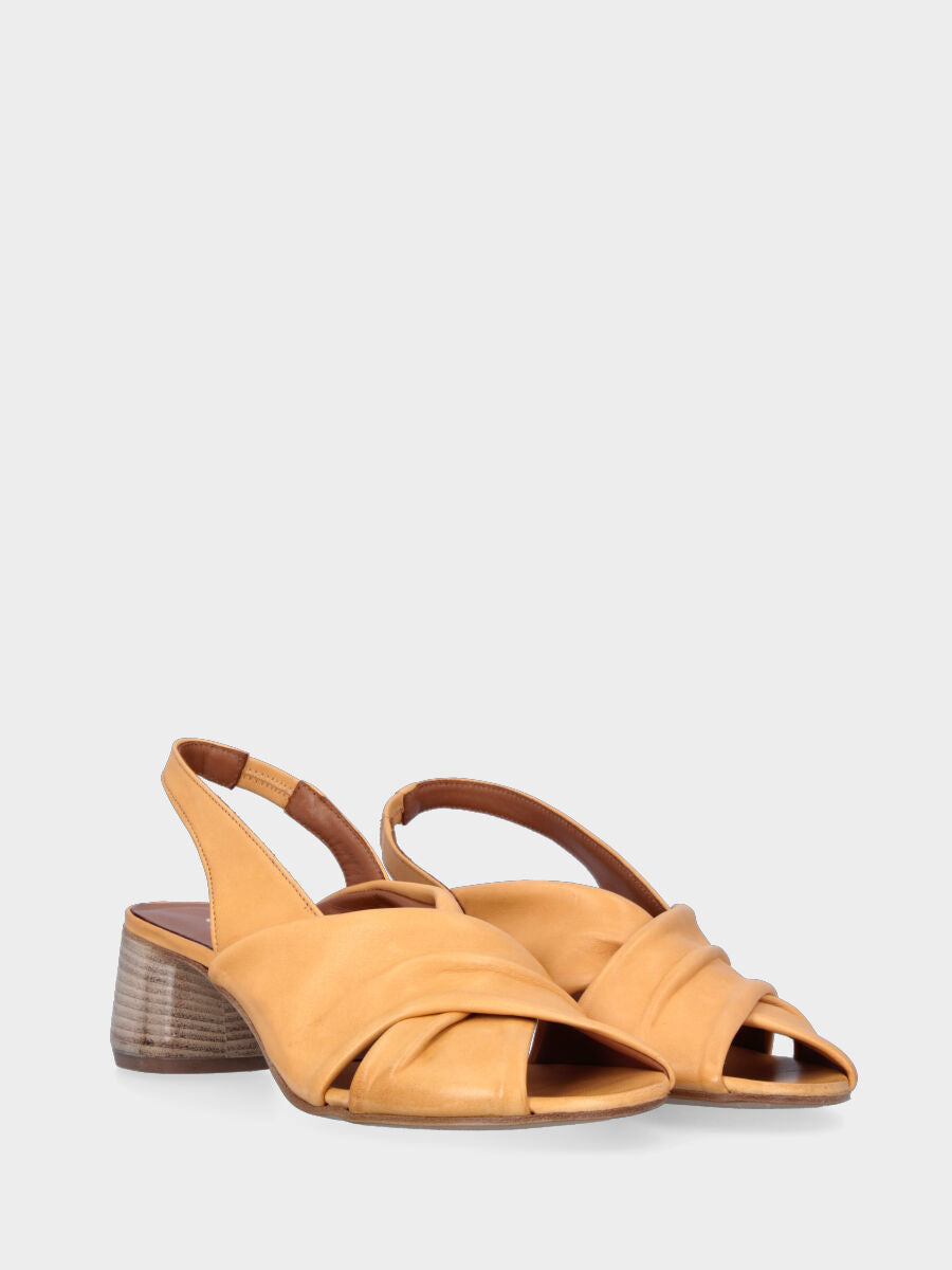 Yellow leather sandal with crossed straps