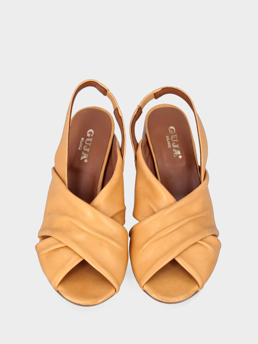 Yellow leather sandal with crossed straps