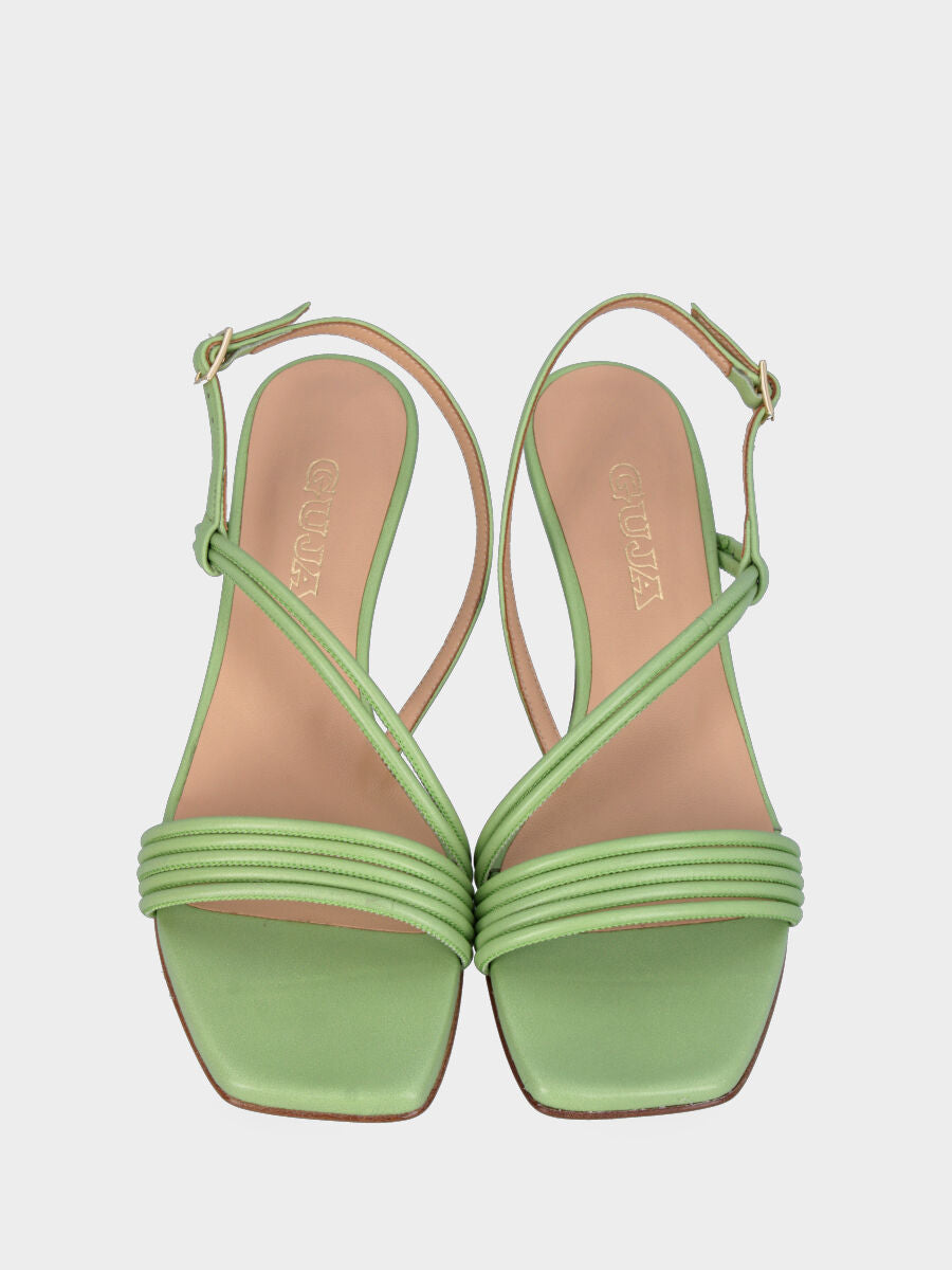 Sandale verte en cuir avec lanières en biais