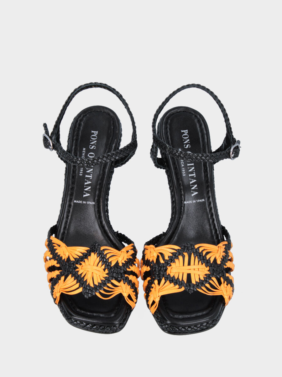 Black leather sandal with yellow braided straps