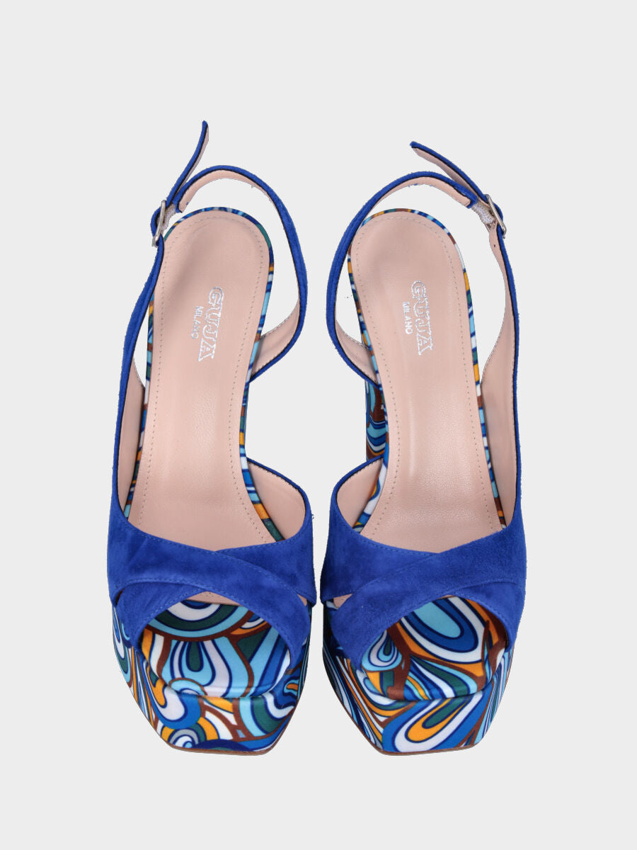 Blauer Ledersandale mit buntem Stoffmuster