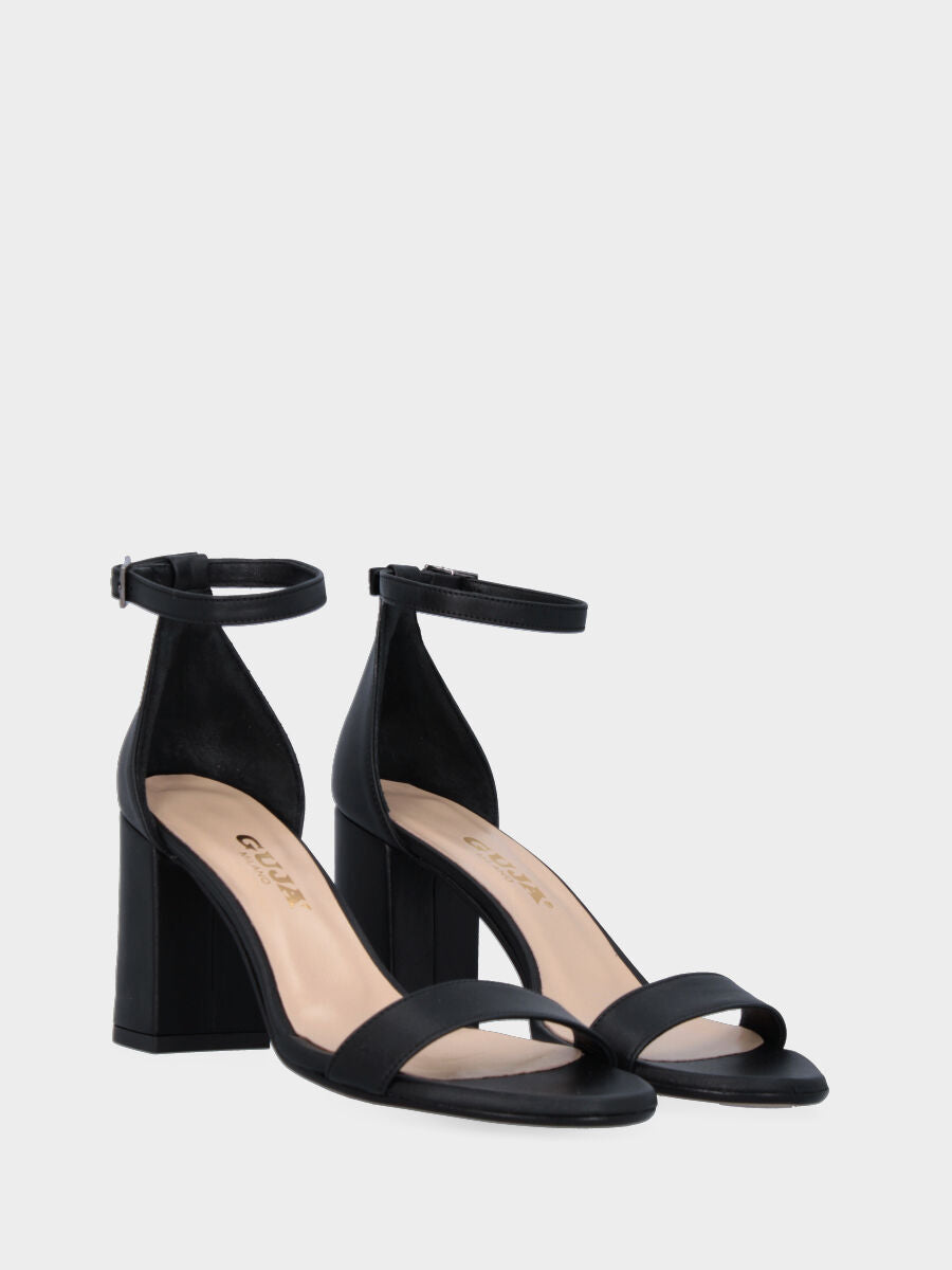 Sandalo nero in pelle con fascia