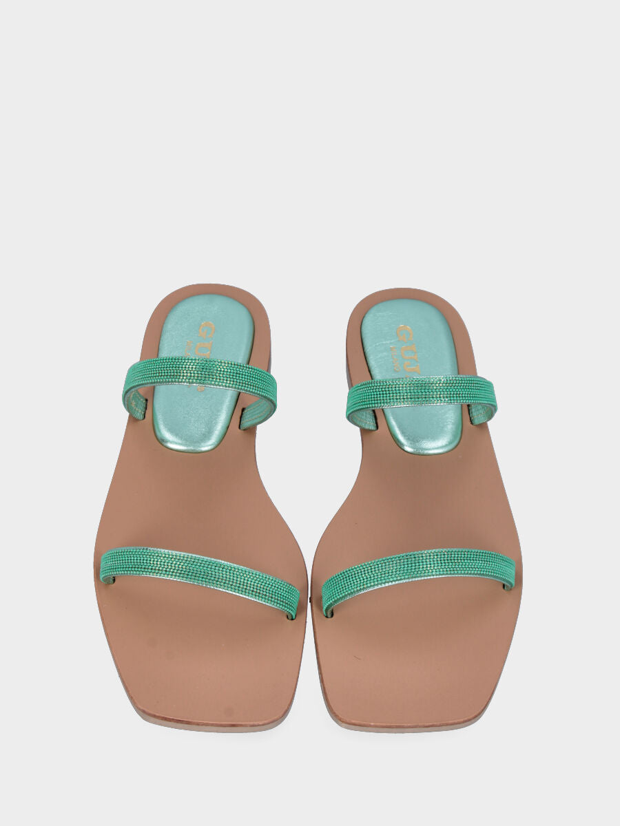 Green laminated slipper with metallic dot straps