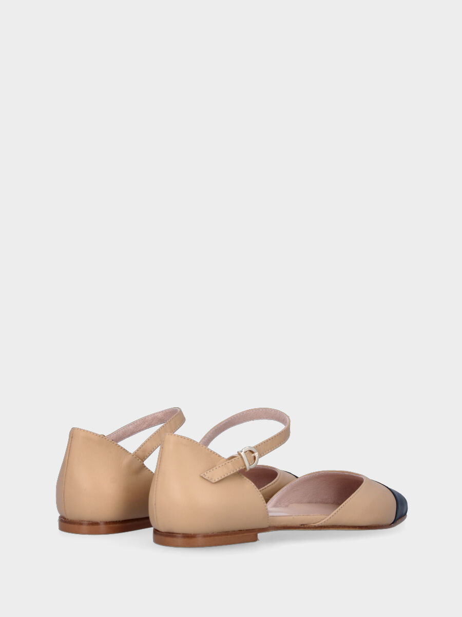 Ballerina aperta ai lati beige in pelle con punta nera