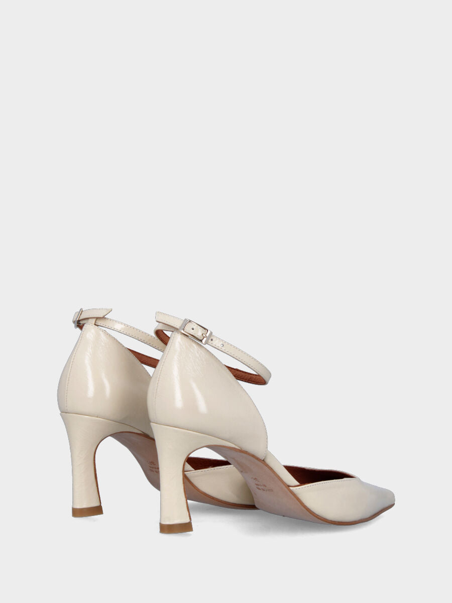 White patent leather pumps with square neckline