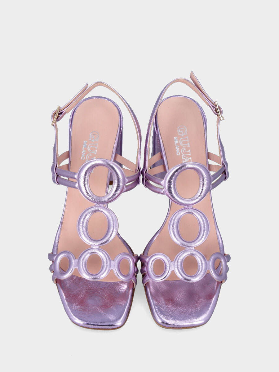 Lilac sandal in laminated leather with circular straps