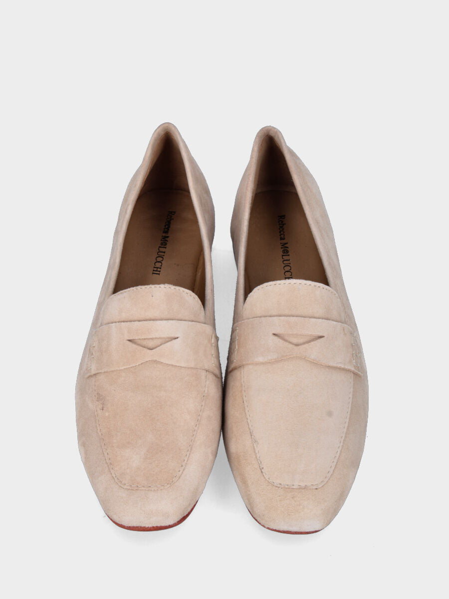 Beige leather moccasin with mask detail