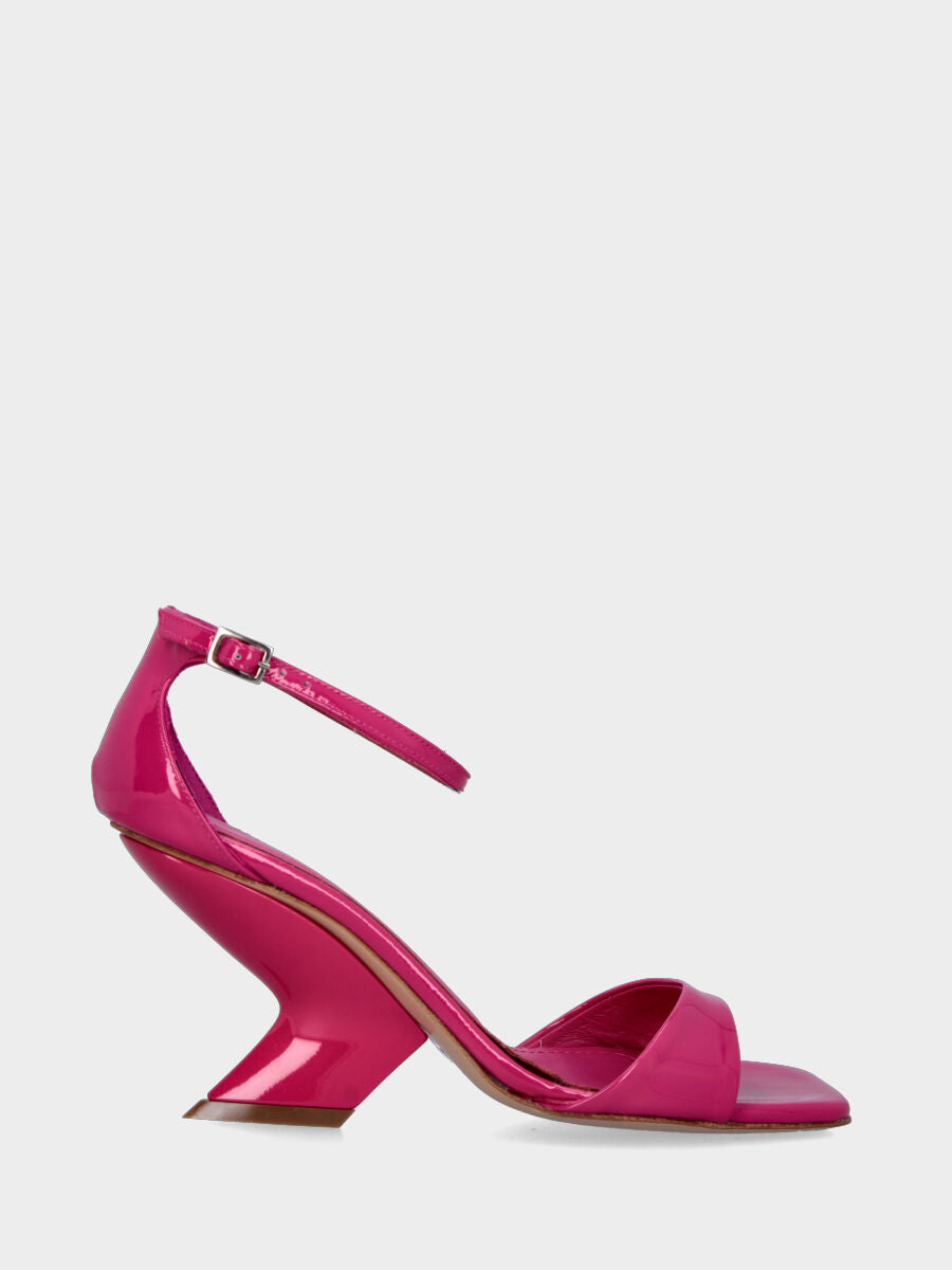 Sandalo fucsia in vernice con zeppa incavata
