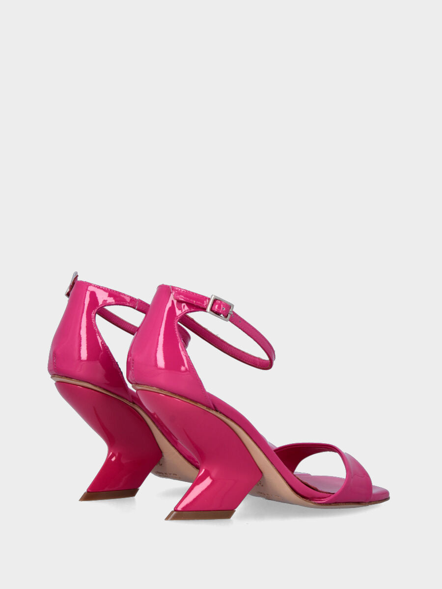 Sandalo fucsia in vernice con zeppa incavata