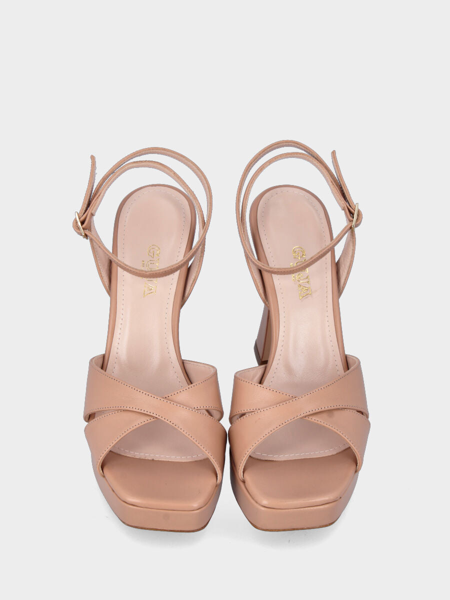 Sandalo nude in pelle con fasce incrociate e plateau