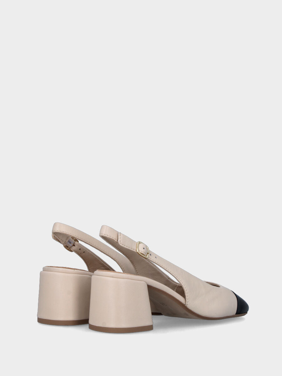 Escarpin slingback beige en cuir avec embout noir et talon large