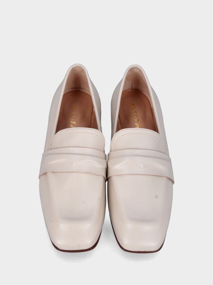 White leather moccasin with embossed mask