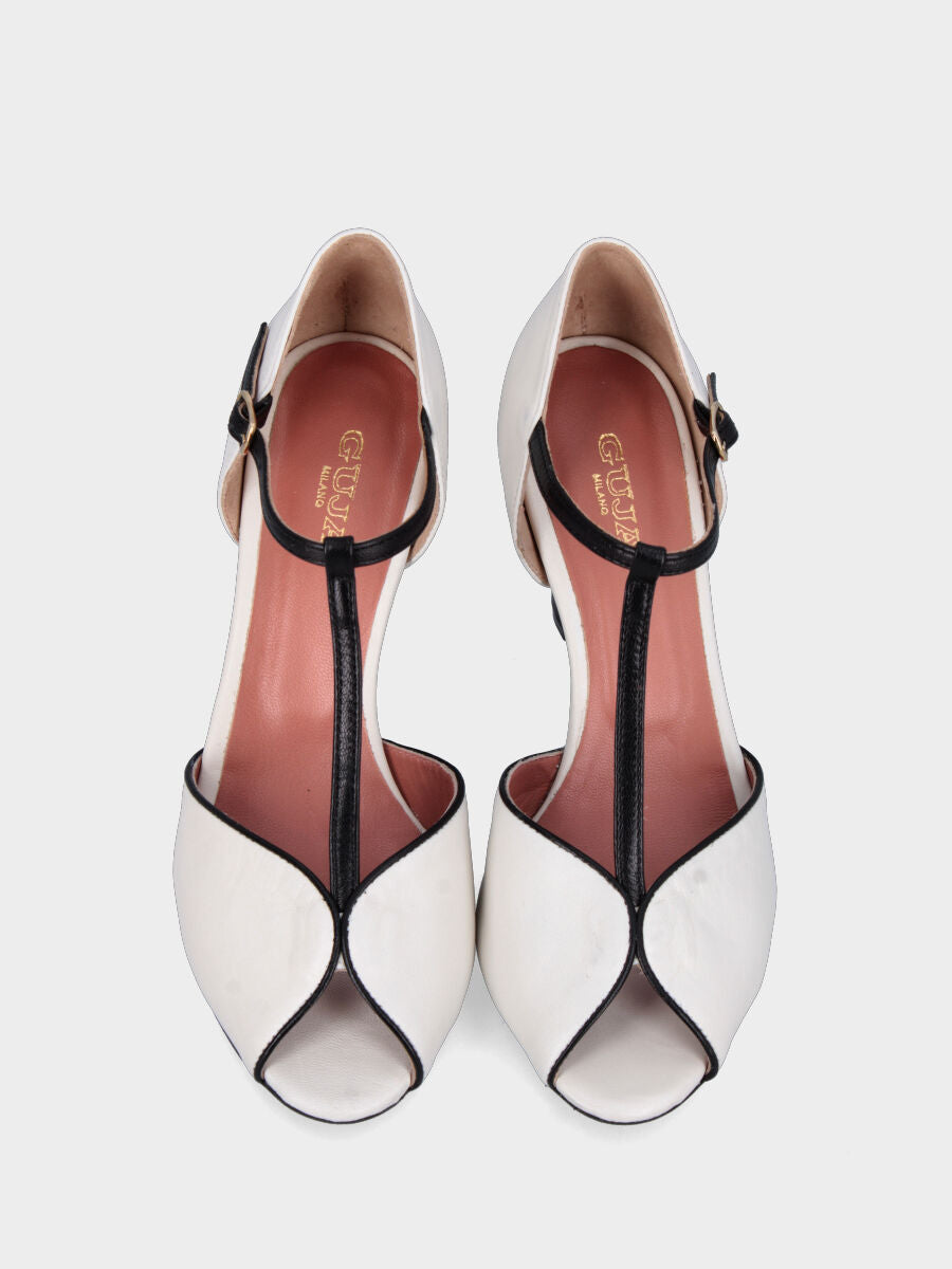 Décolleté modello charleston bianca in pelle con tacco nero