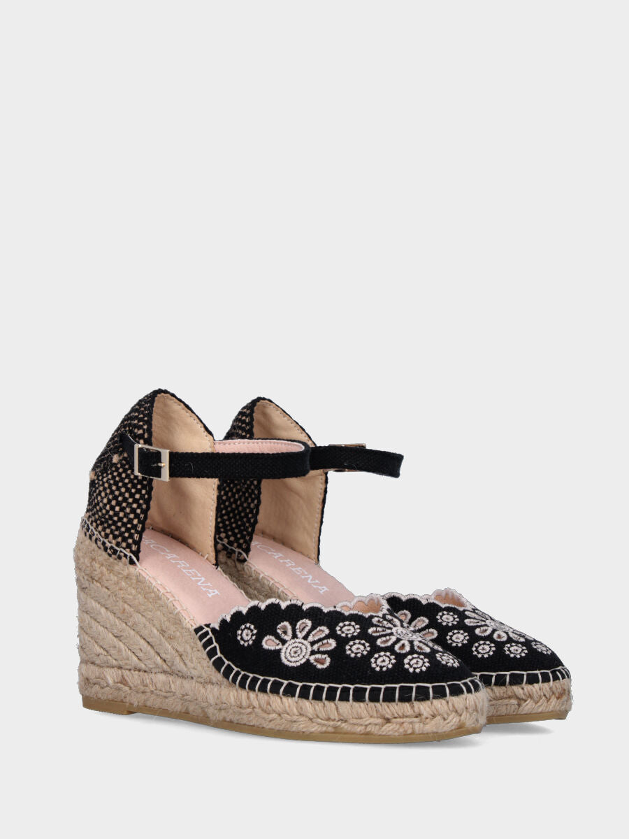 Black fabric peasant with perforated flowers